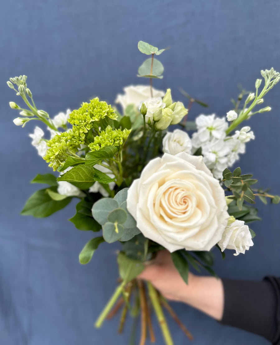 White and green hand tied bouquet $50