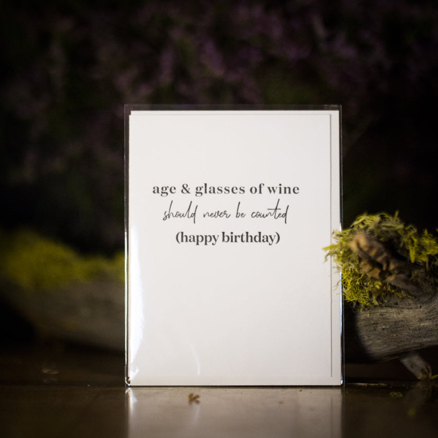 “Age and glasses of wine should never be counted (happy birthday)” card