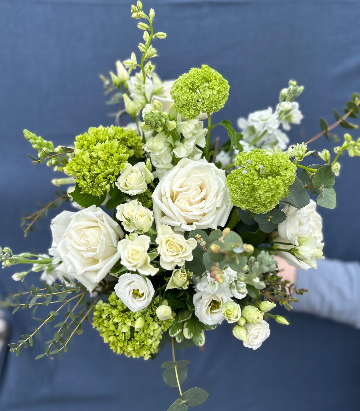White and green hand tied arrangements