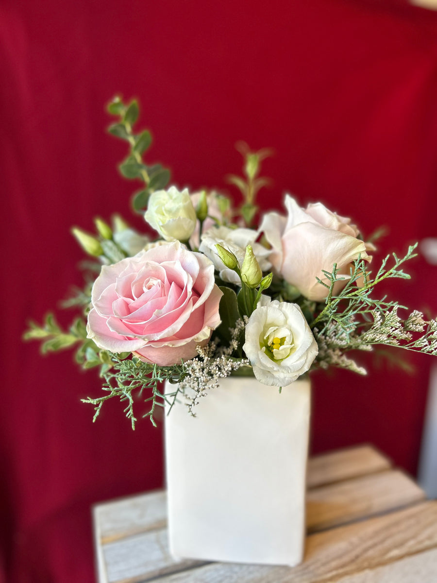 Pretty in pink in white vase