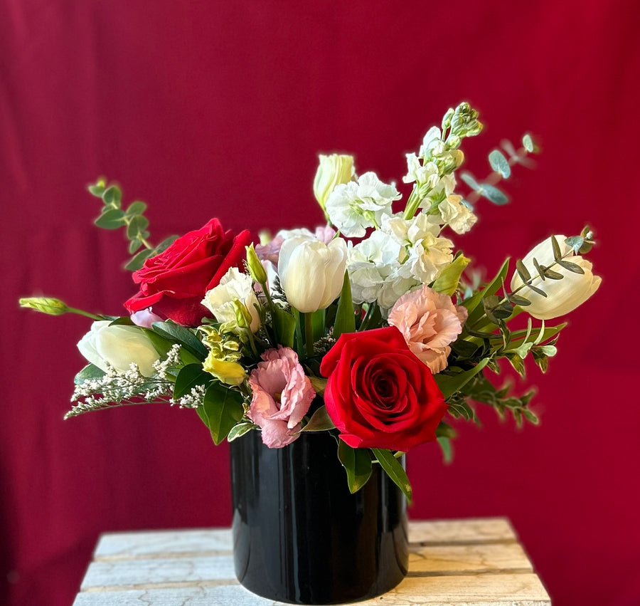 Pretty valentines in black ceramic pot.