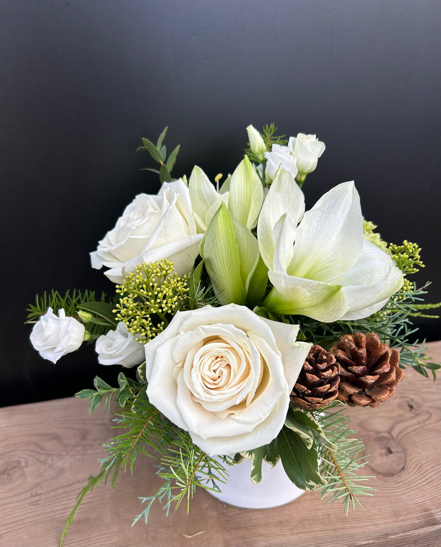 Small red and white florals in white vase