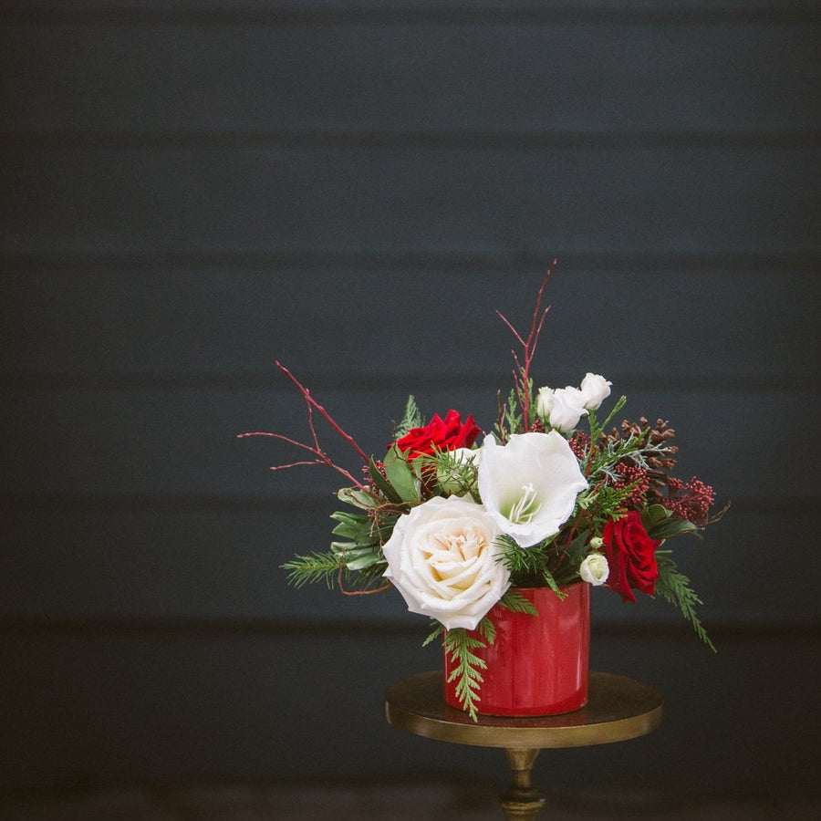 Cute red pot with white and red flowers
