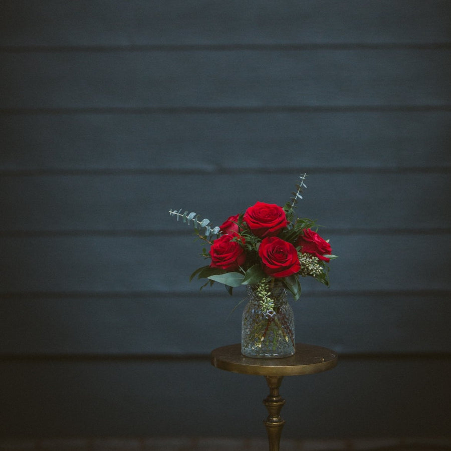 1/2 dozen red roses in vase