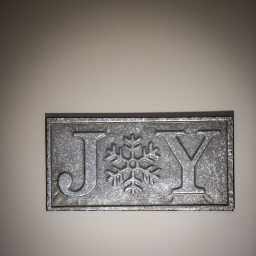 “Joy” tin sign