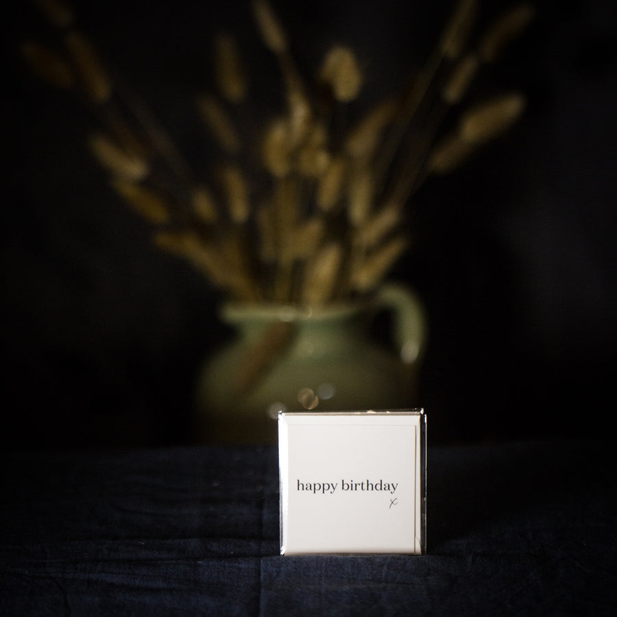 “Happy birthday x” small white card
