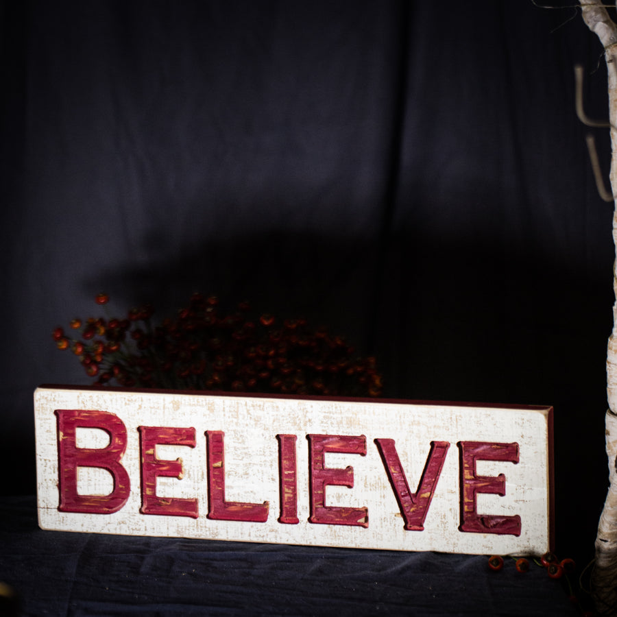 “Believe” sign