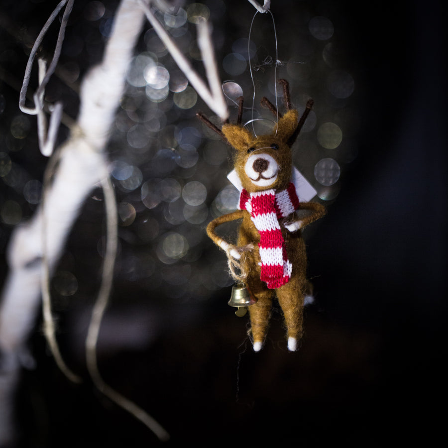 Reindeer with bell ornament