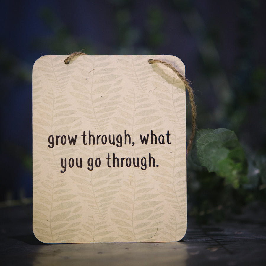 “ grow through what you go through” sign