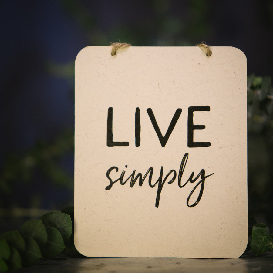 “Live Simply” sign