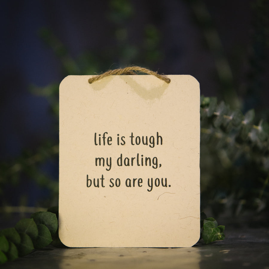 “Life is Tough...” sign